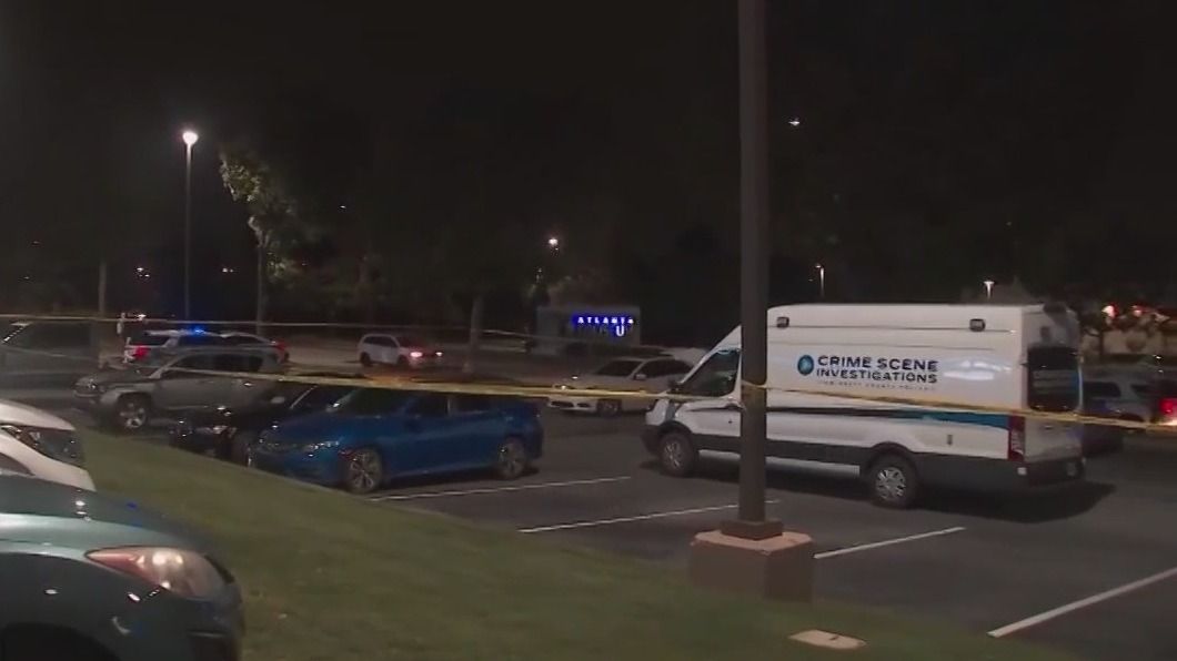 6 arrested after body found in truck of car
