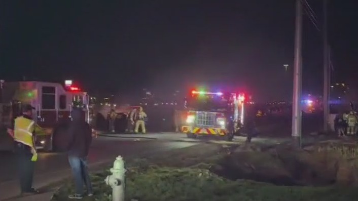 Vehicle fire, crash cause traffic backup on I-35