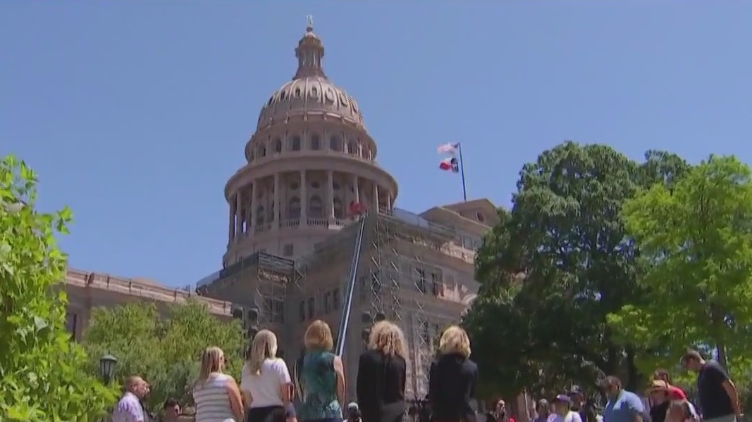 Rally held at State Capitol to protest 'rolling back of civil rights'