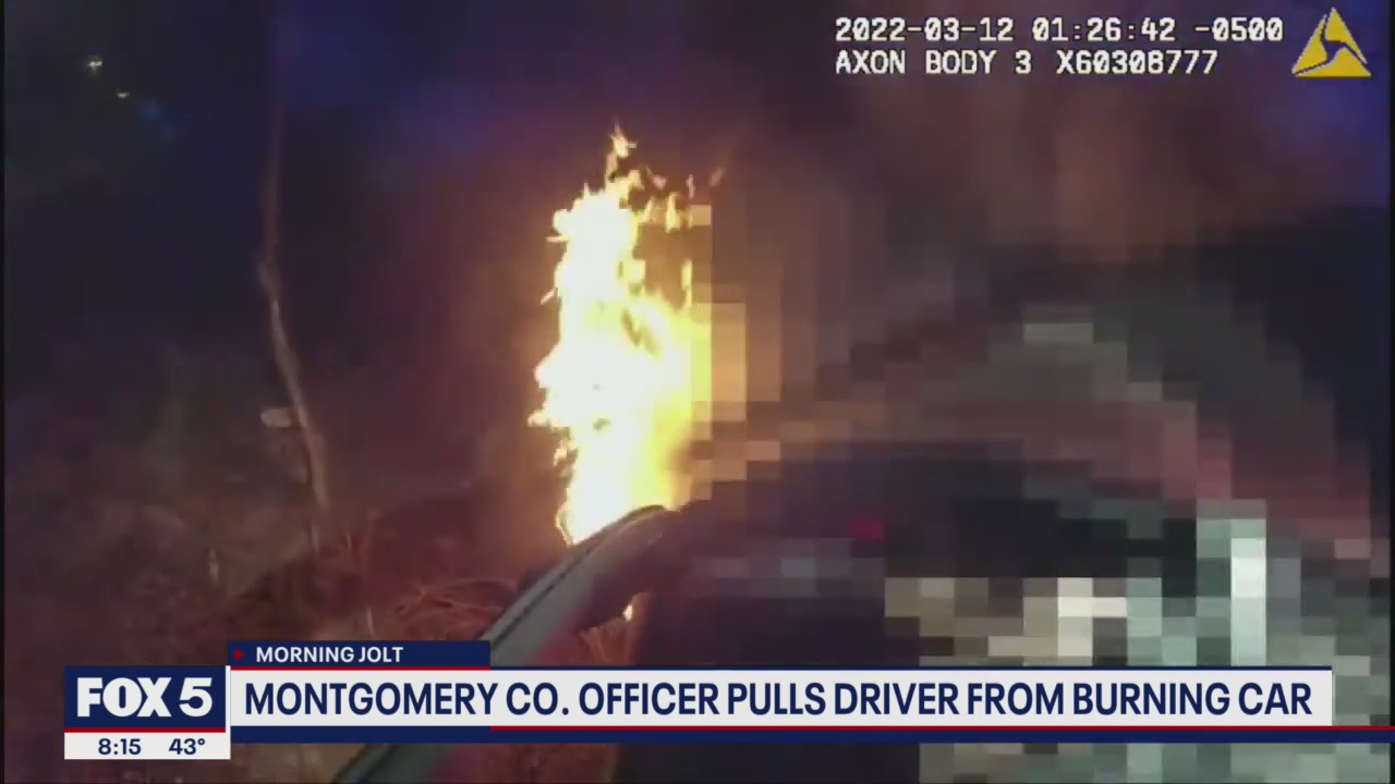 Video shows Montgomery County police officers rescue driver from burning vehicle