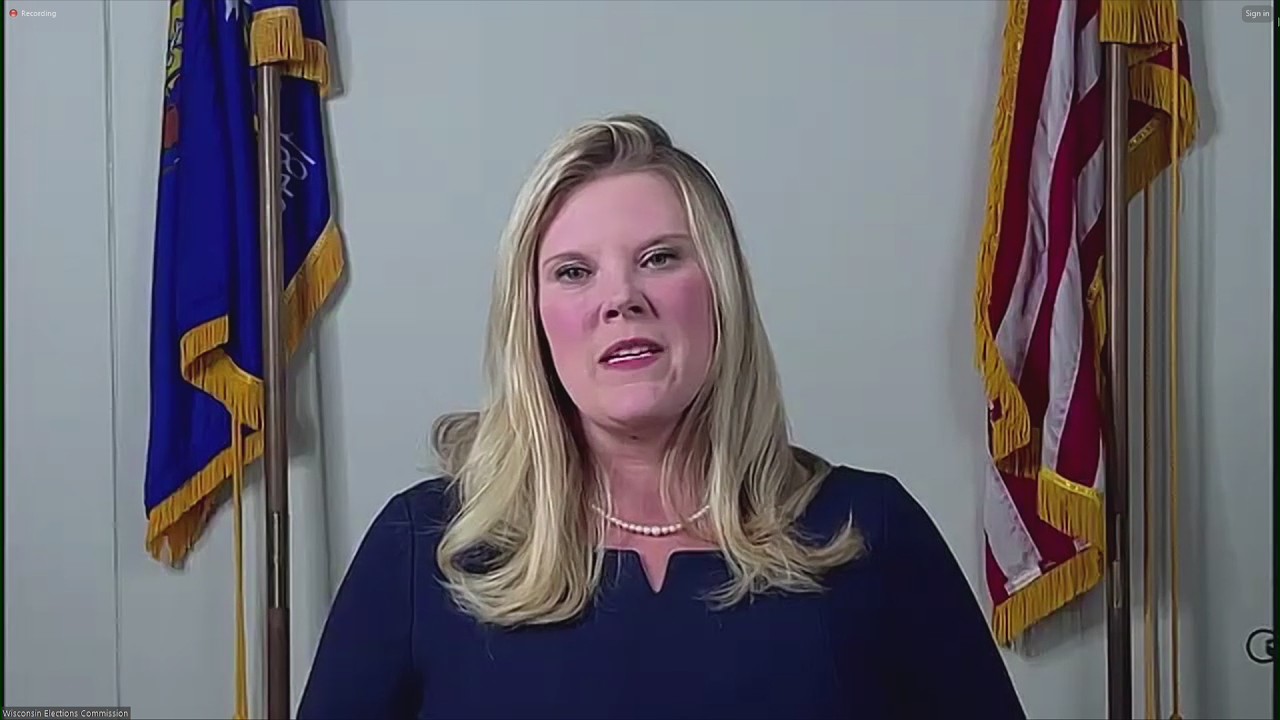 Wisconsin Elections Commission Administrator Meagan Wolfe reacts to Senate vote