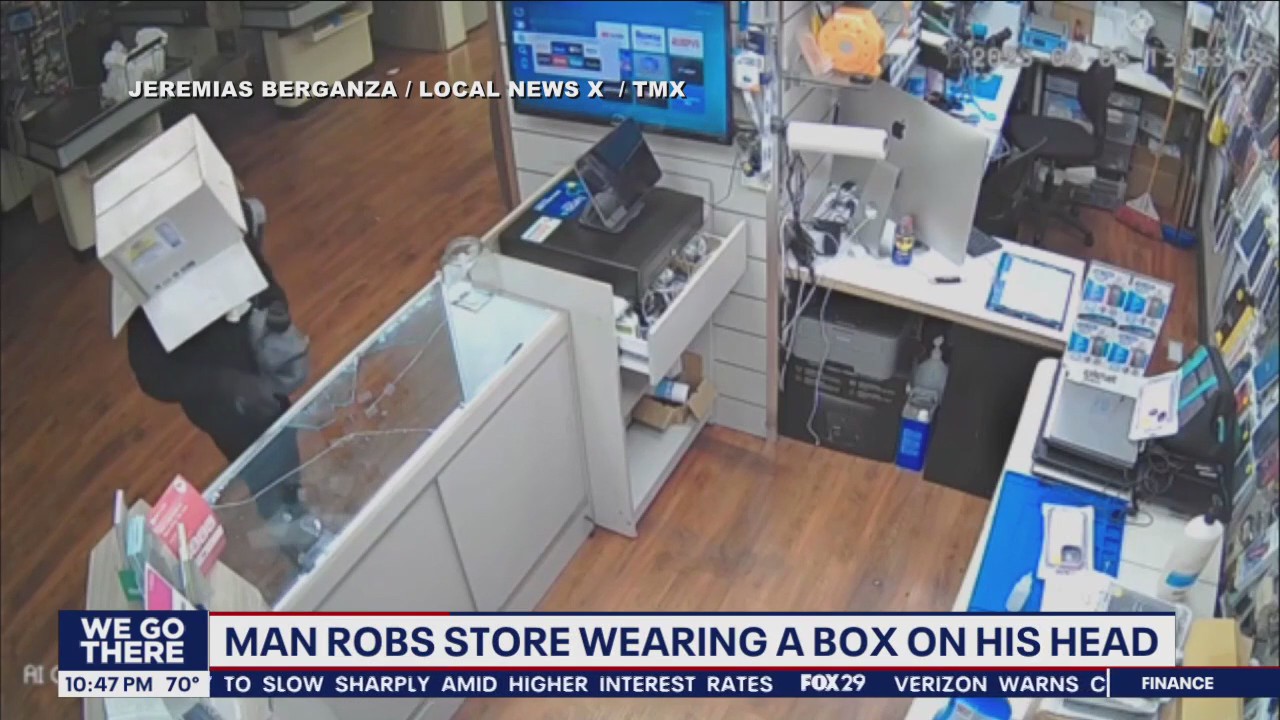 Caught on camera: Man robs store wearing box on his head