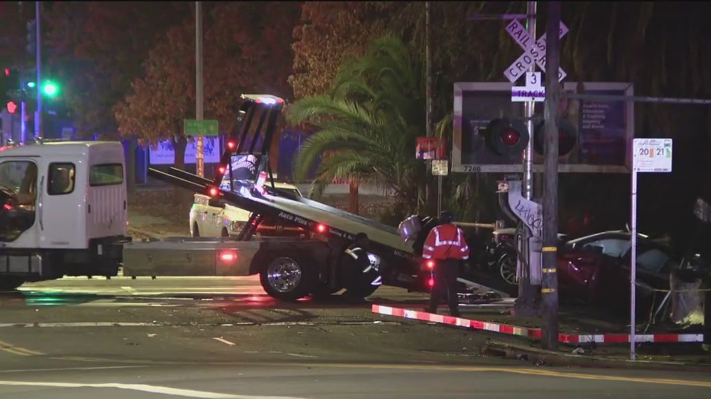 BMW crushed by Amtrak train after driver goes around downed arm in Oakland