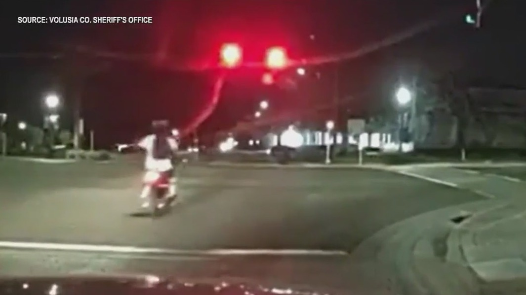 Rider hit by truck after running red light, deputies say