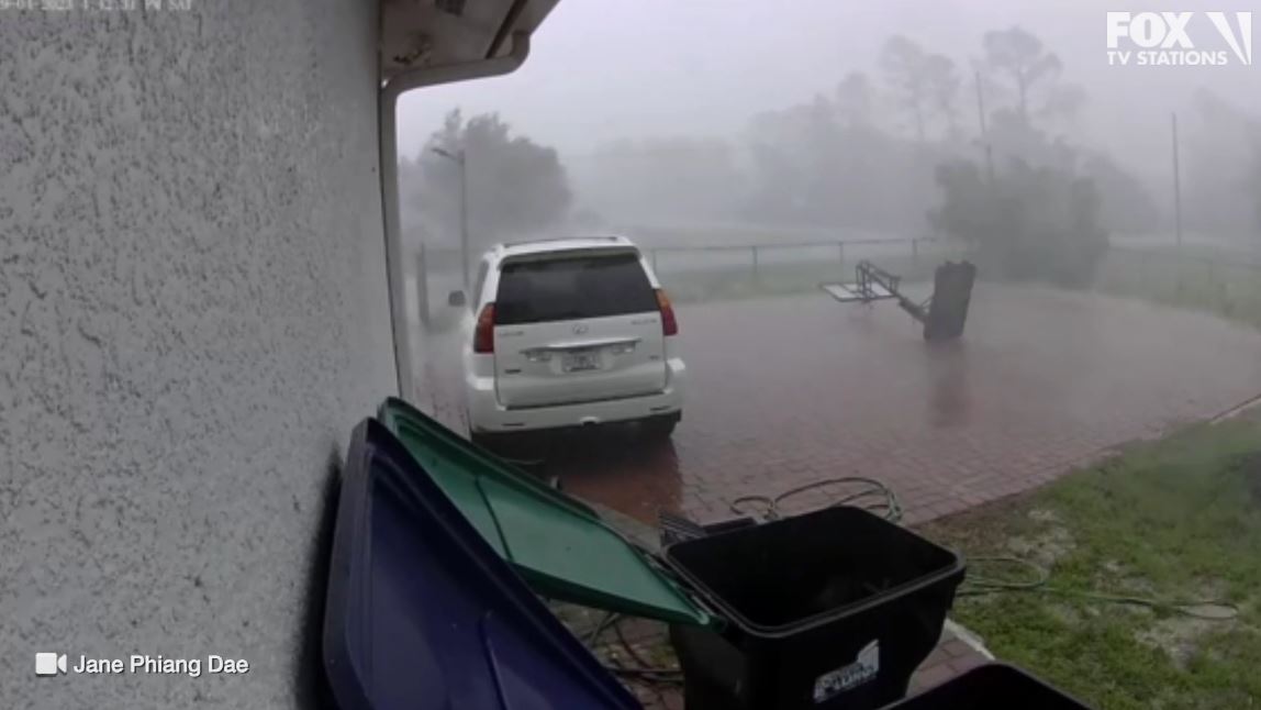 Slam dunk: Hoop falls during intense storm