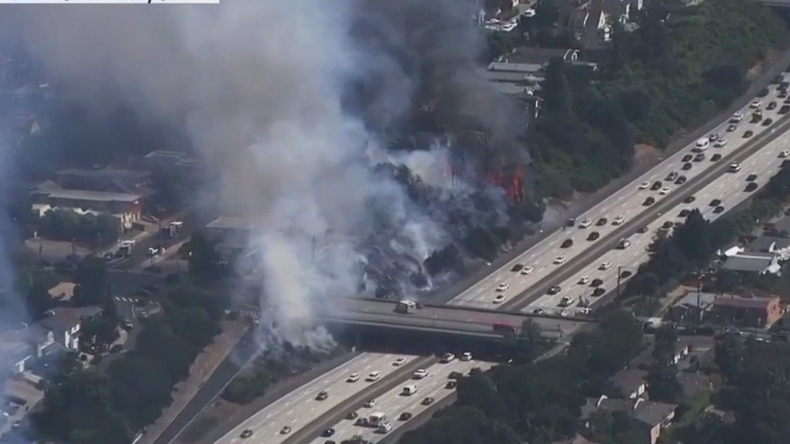 Large fire burning next to I-580