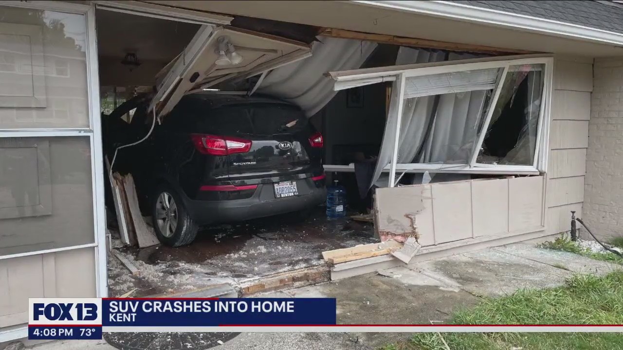 Car crashes into Kent home