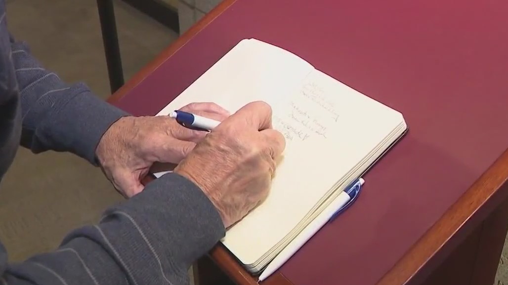 Visitors at The Carter Center pay tribute to Rosalynn