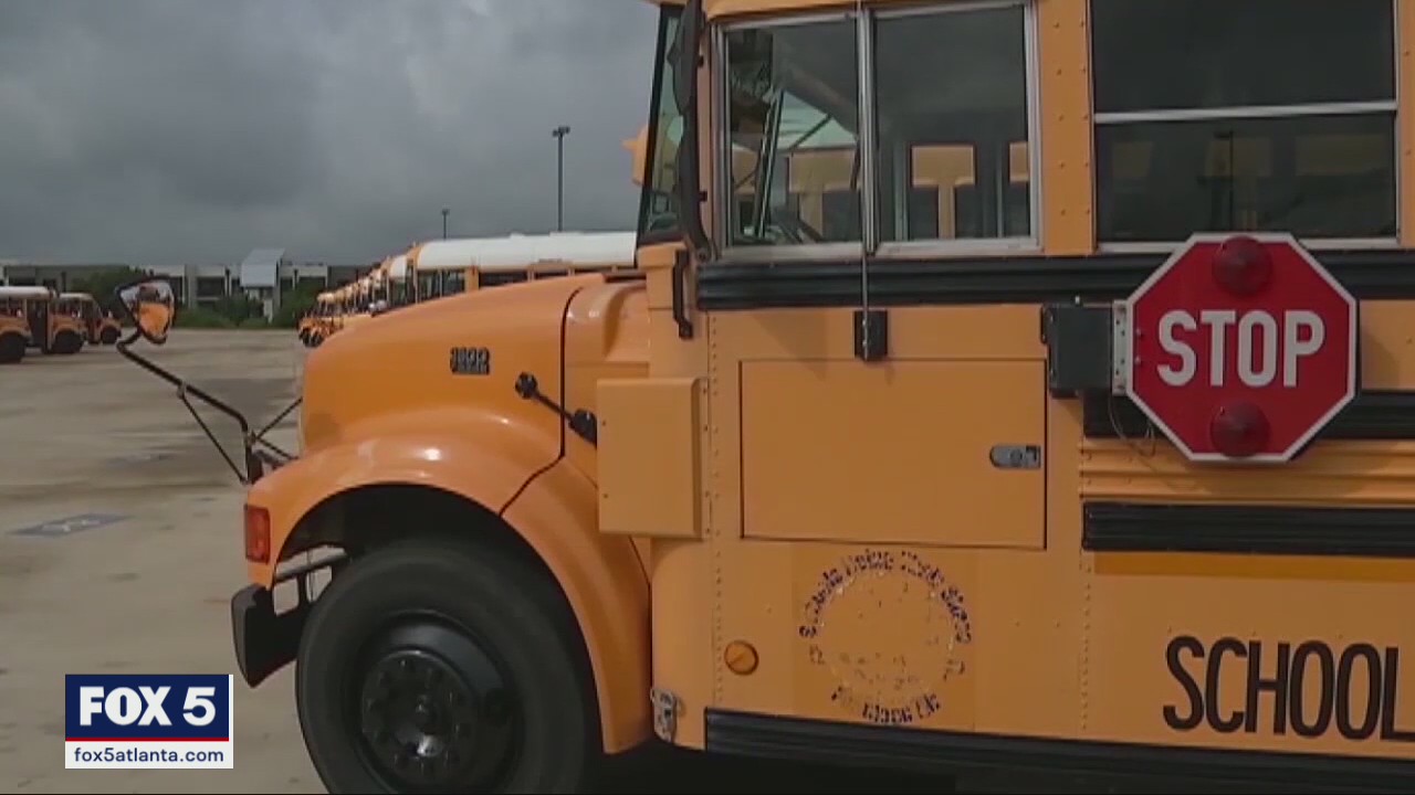 Woman charged with attacking bus driver