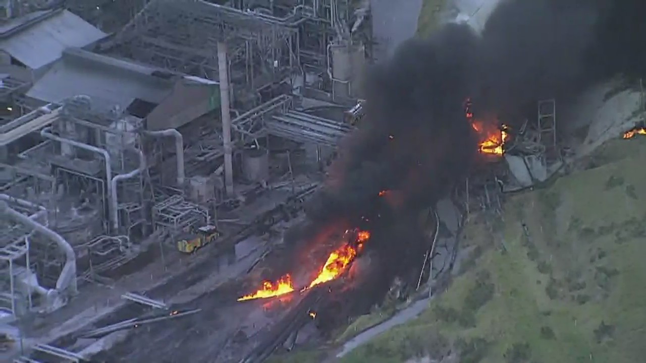 Aerials: Large brush fire at Mosaic property