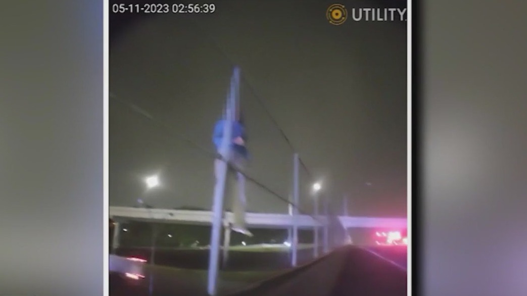 Rookie cop saves woman threatening to jump