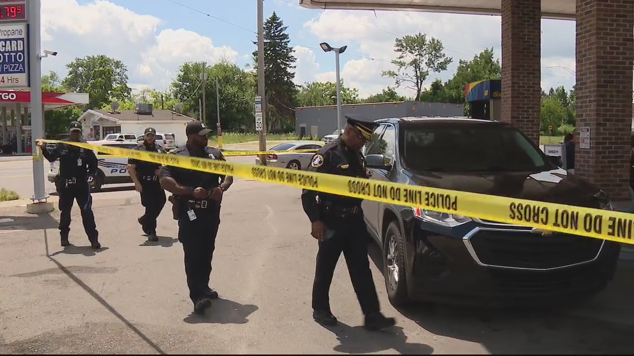 Police officer almost run down by stolen vehicle suspect at Detroit gas station