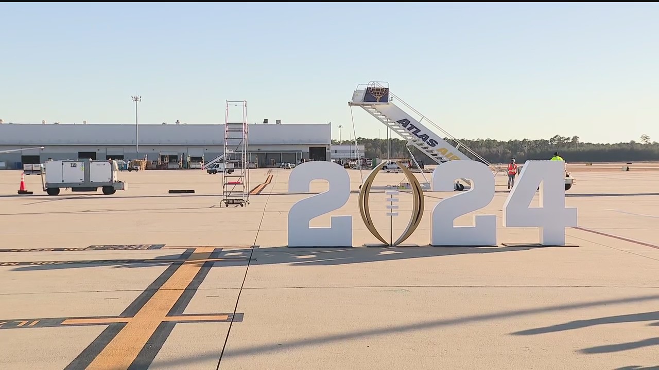 Michigan arrives in Houston for CFP championship