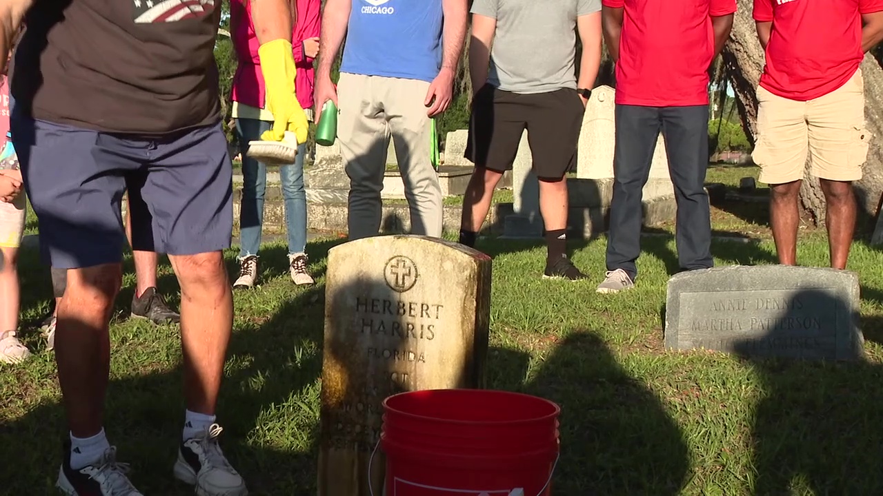 Tampa Bay area volunteers clean graves of fallen soldiers