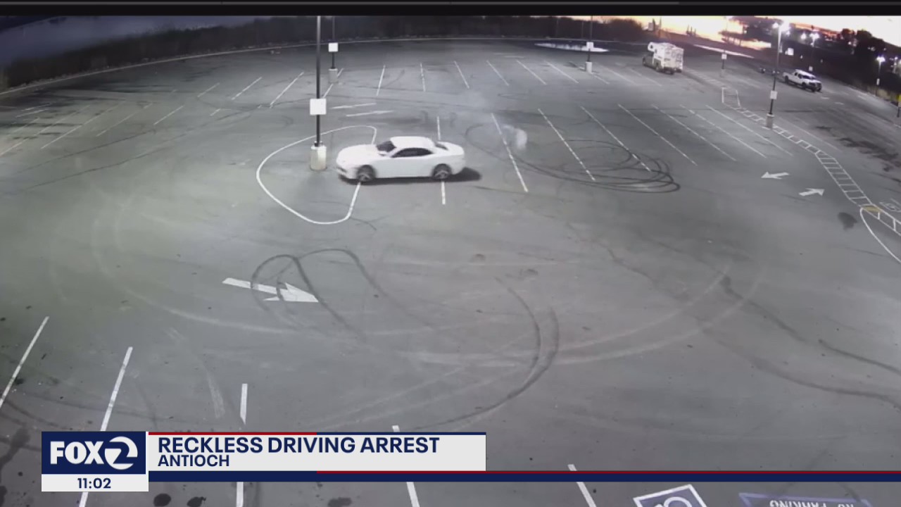 'Reckless' driver hits light pole while doing donuts