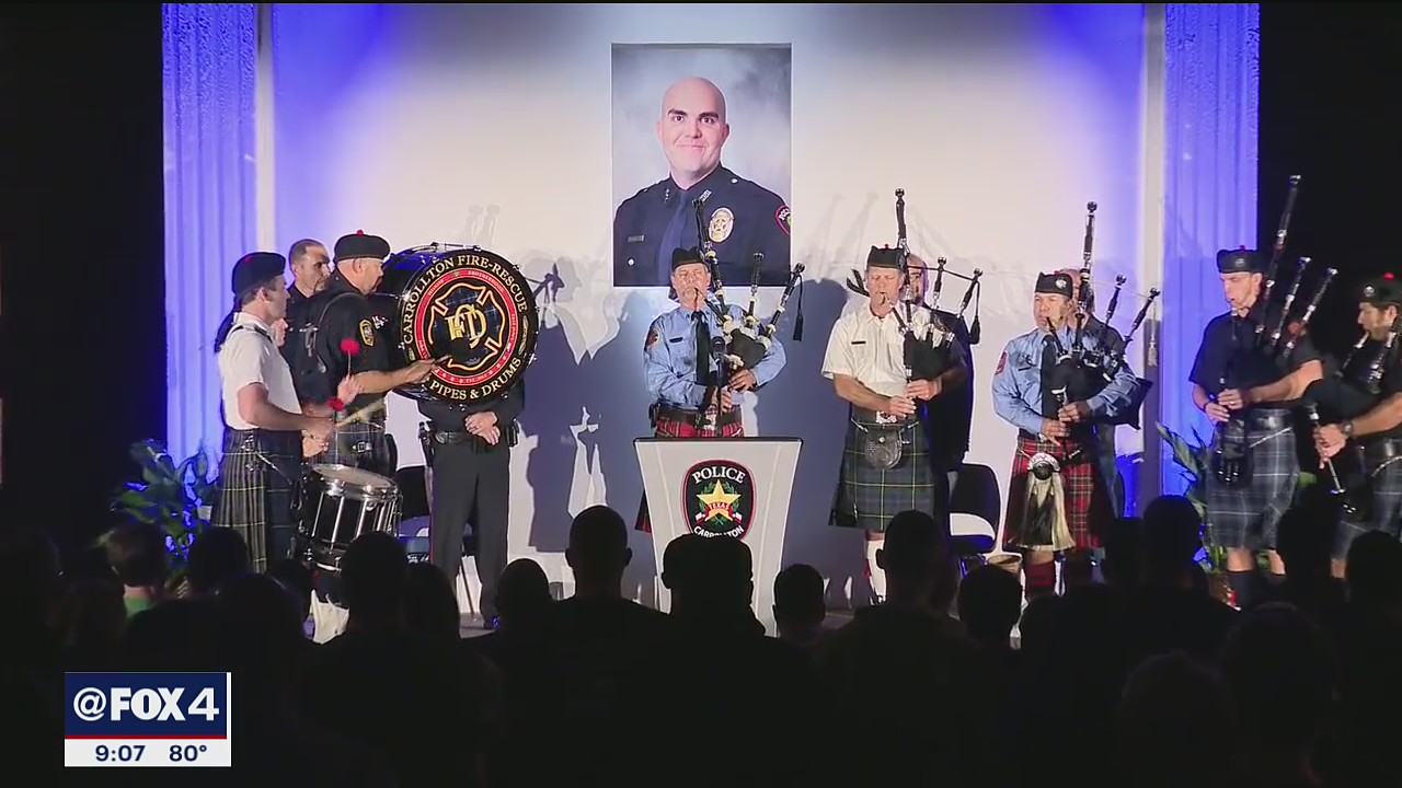 Candlelight vigil held for fallen Carrollton police officer