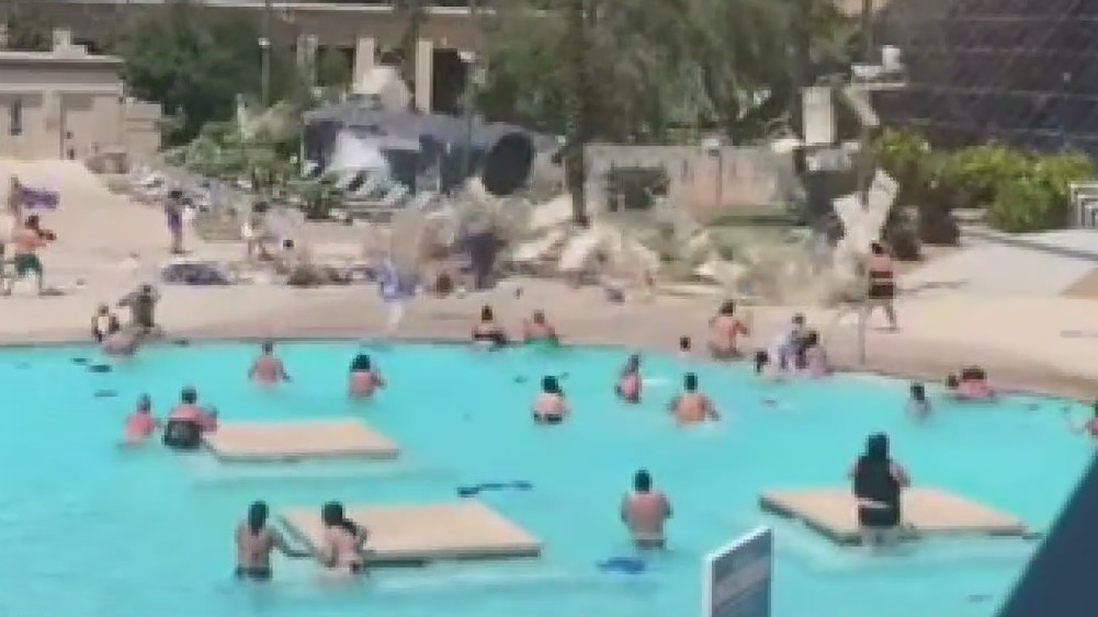 Dust devil sends pool furniture flying at Vegas hotel pool
