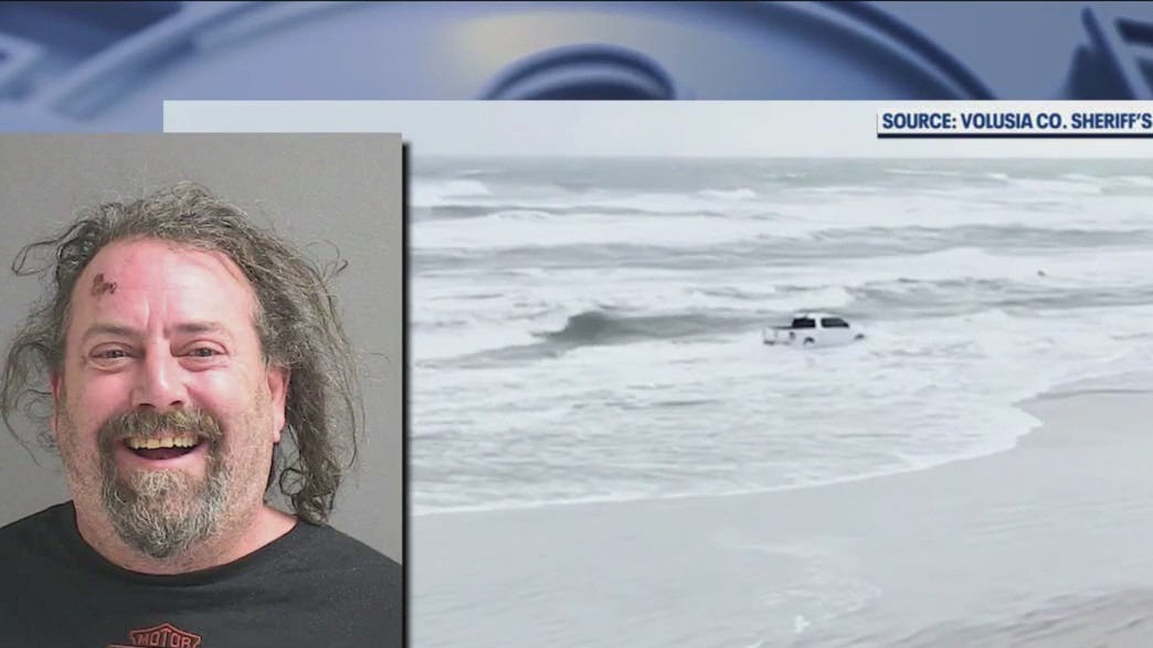 Man drives pickup truck into ocean at Florida beach