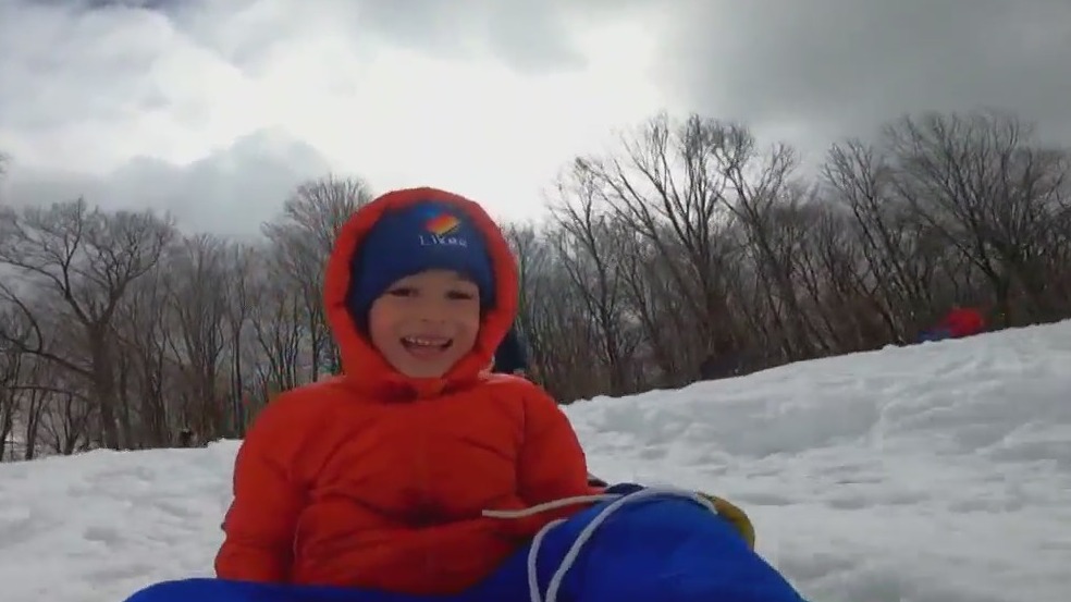 Enjoying snow after winter storm