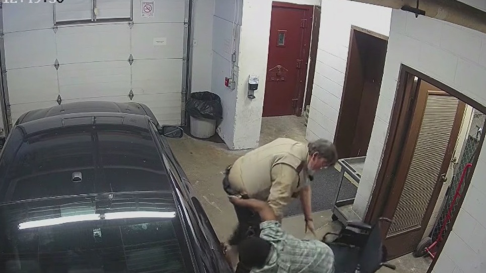Inmate in wheelchair takes officer's gun