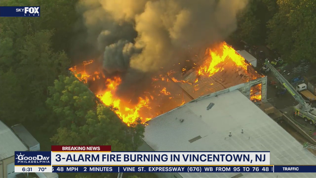 Three-alarm fire tearing through Mount Holly Motorsports in Burlington County