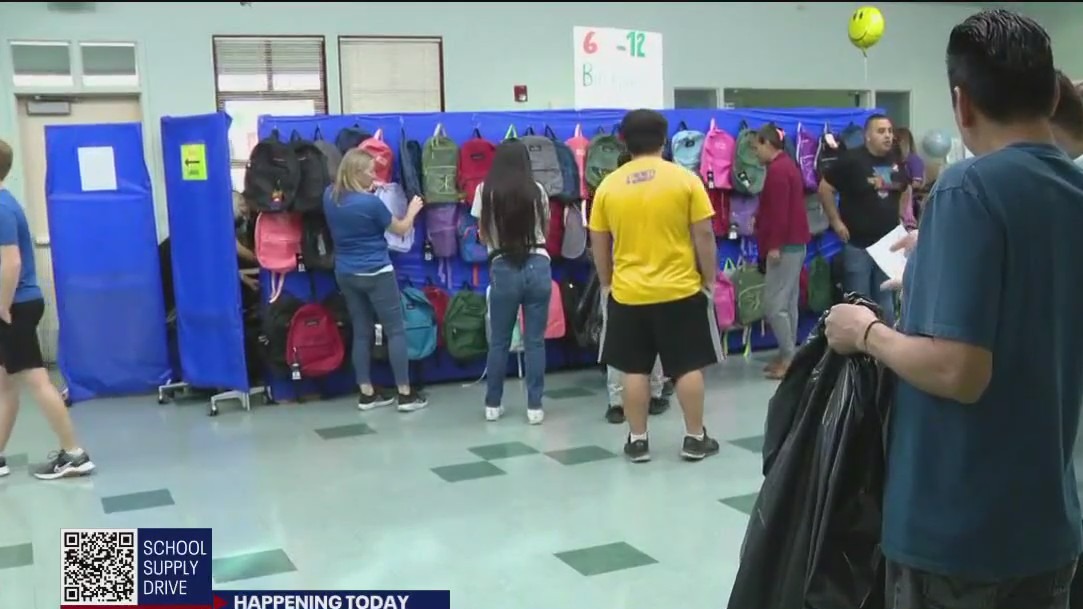Volunteers give away thousands of backpacks in San Mateo