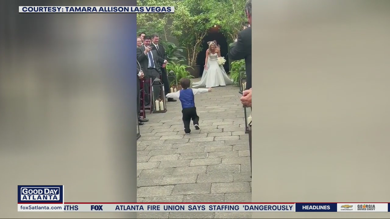 Toddler can't contain his excitement to watch mom get married