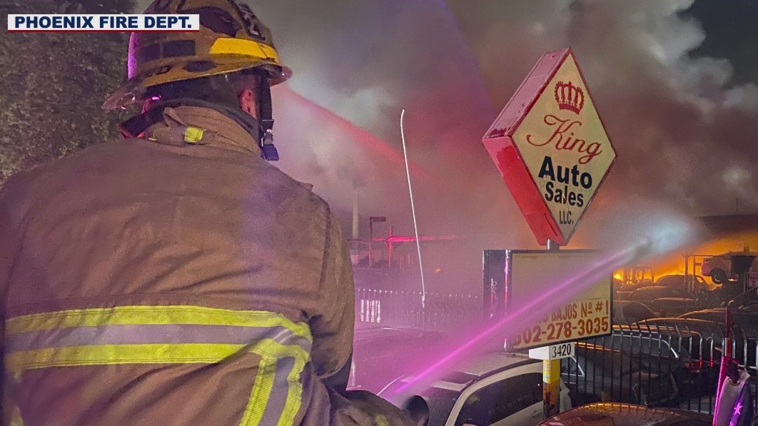 Firefighters battle fire at Phoenix auto yard
