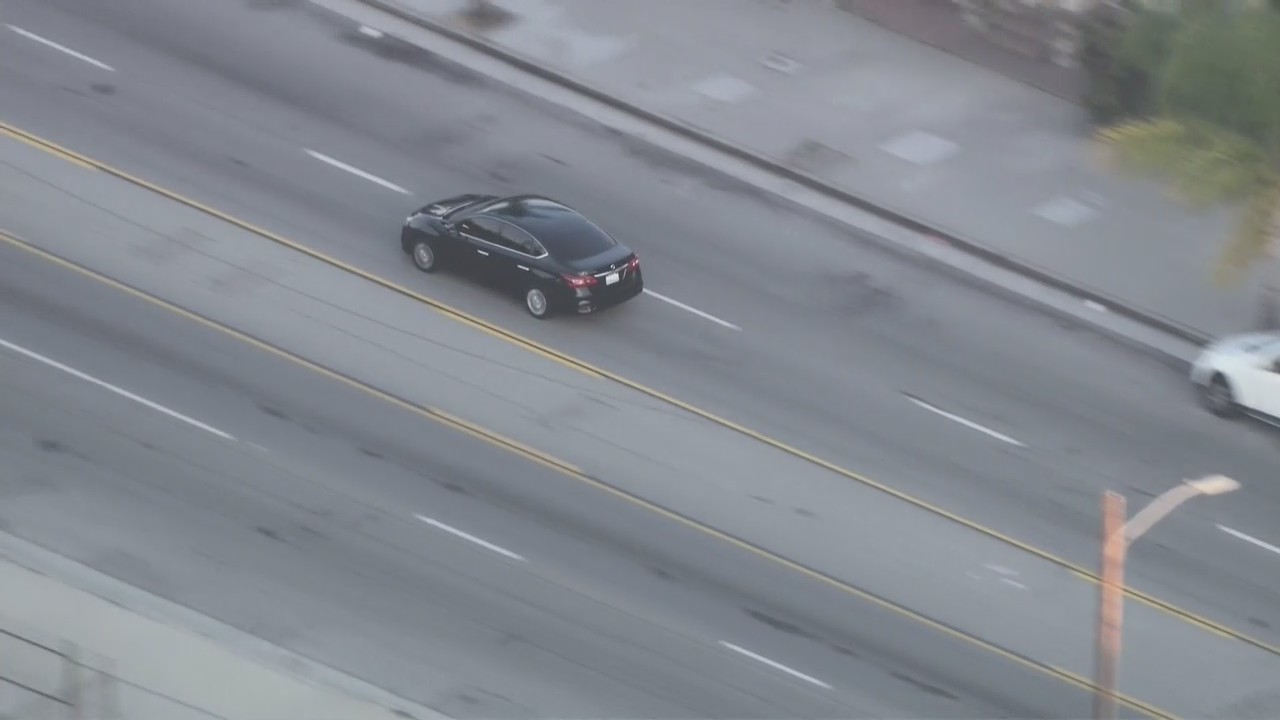 Suspects run out of vehicle during LA pursuit