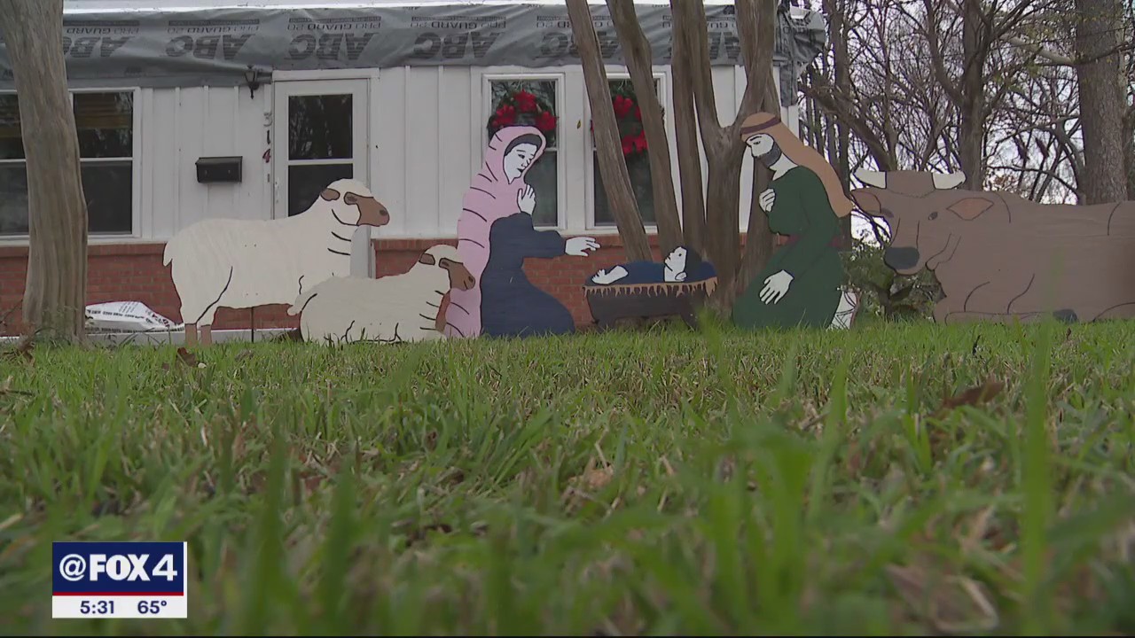Storm throws Grapevine homeowners' porch onto roof, manger scene untouched