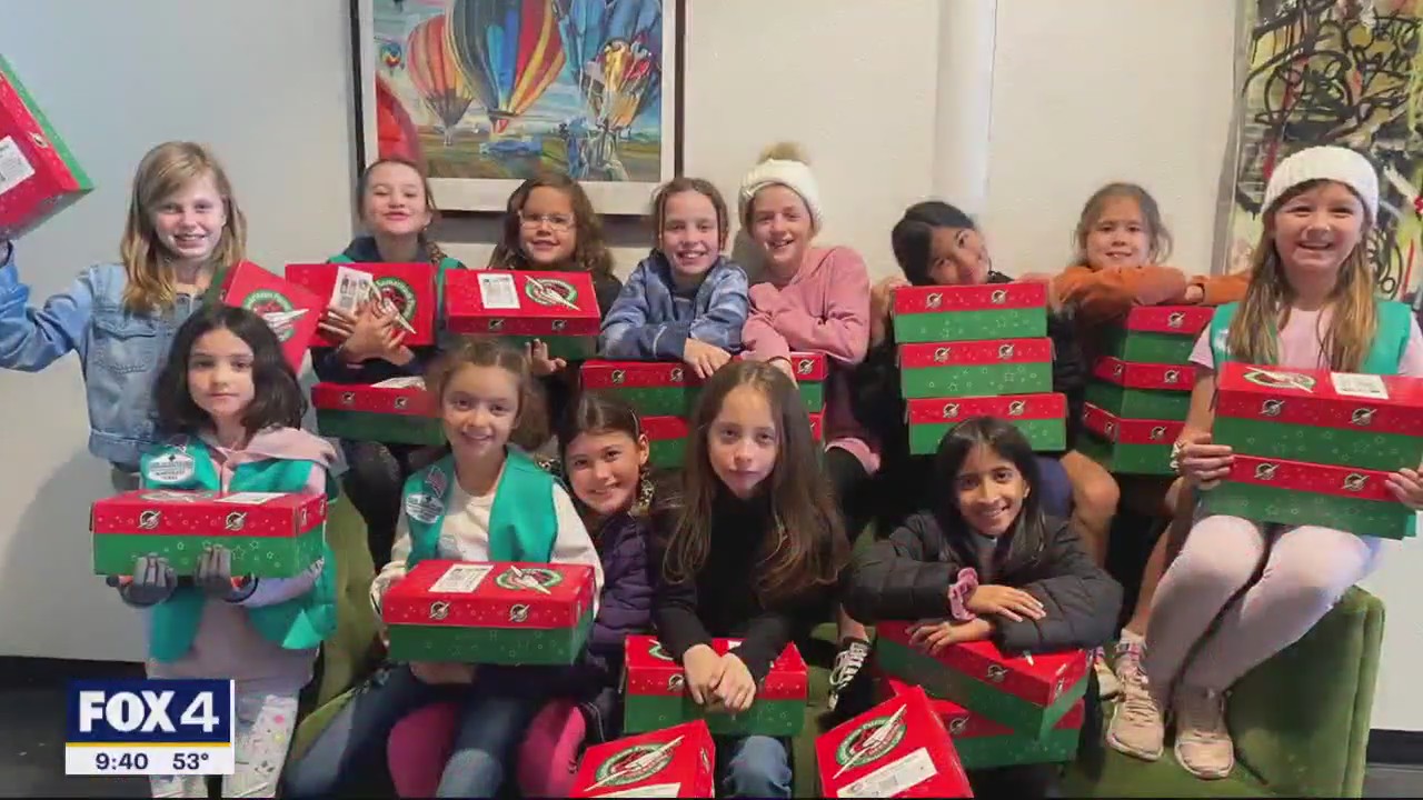 Volunteers fill Operation Christmas Child gift boxes