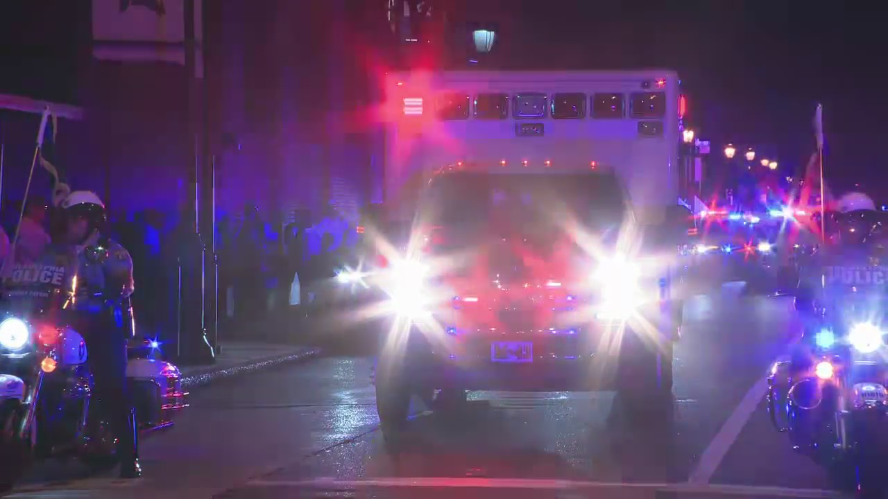 Procession leads fallen Philadelphia police officer to medical examiner's office