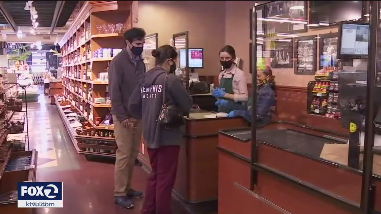 Californians must continue wearing mask indoors for another month
