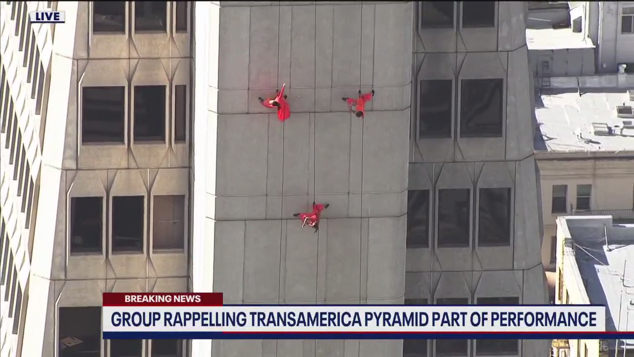 Performers rappel on SF's Transamerica pyramid