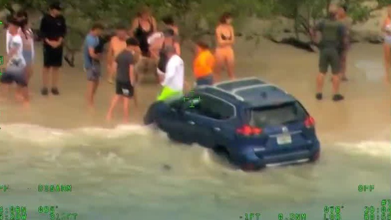 Alleged drunk driver arrested after near-miss with families on Florida beach
