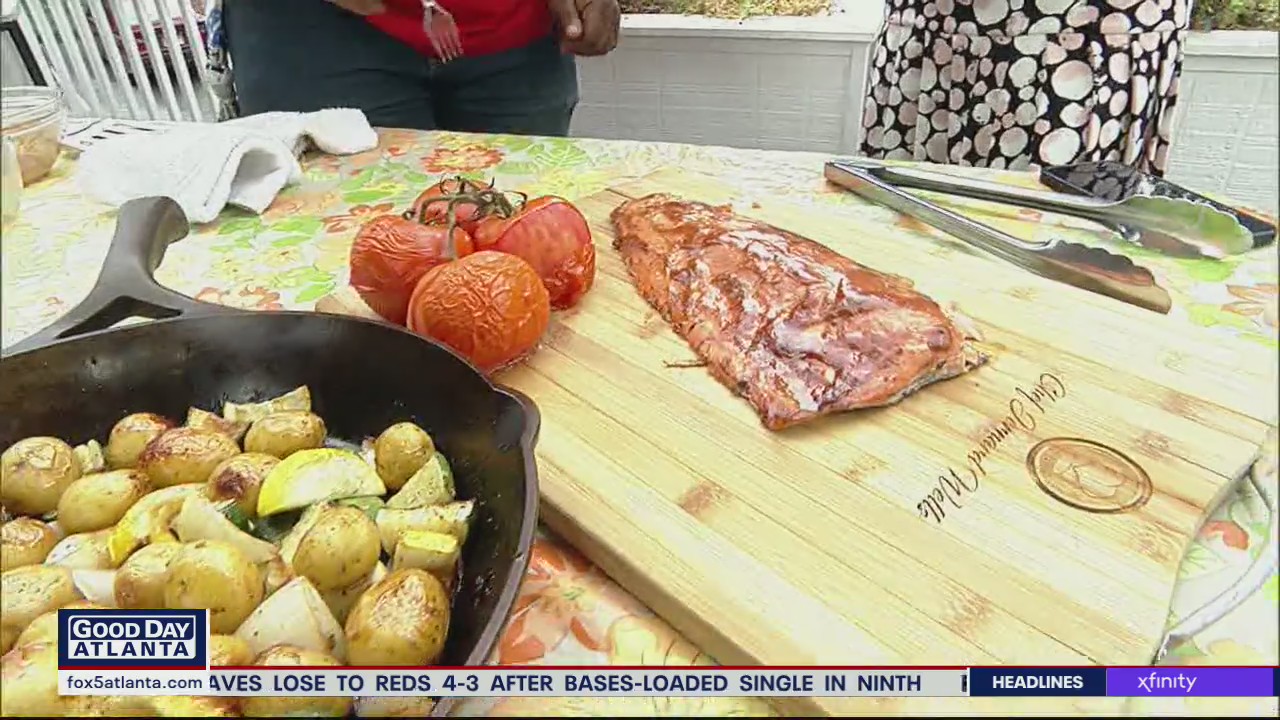 Cher Jernard Wells shows off his BBQ grilled salmon recipe