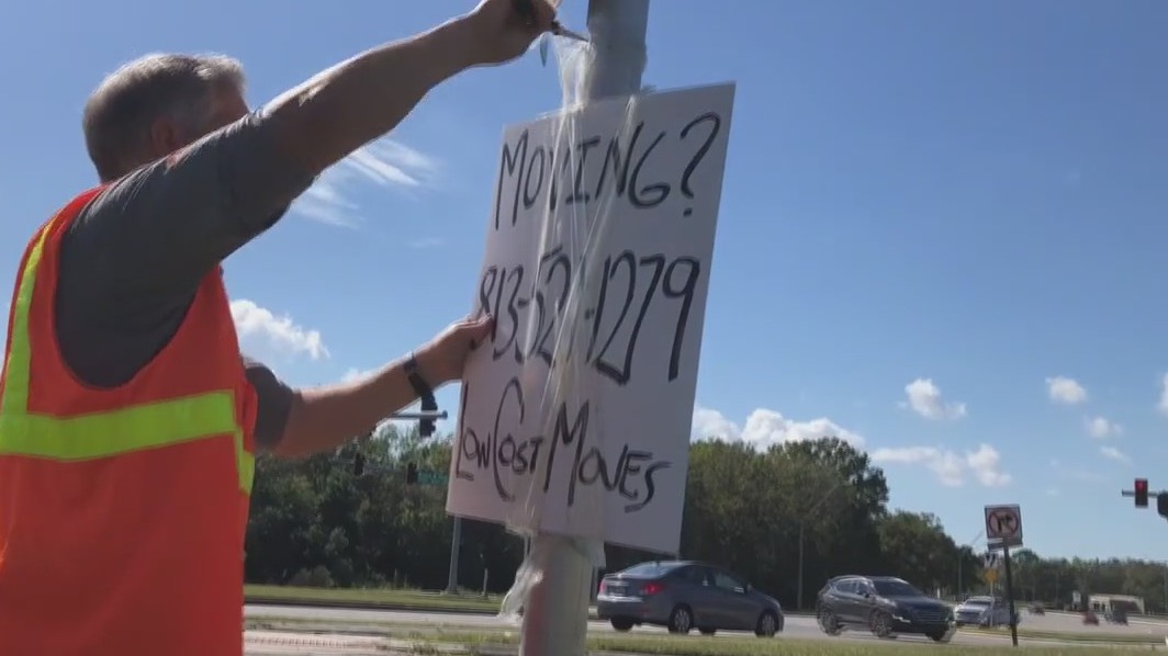 Crews remove illegal signs from Hillsborough roadways