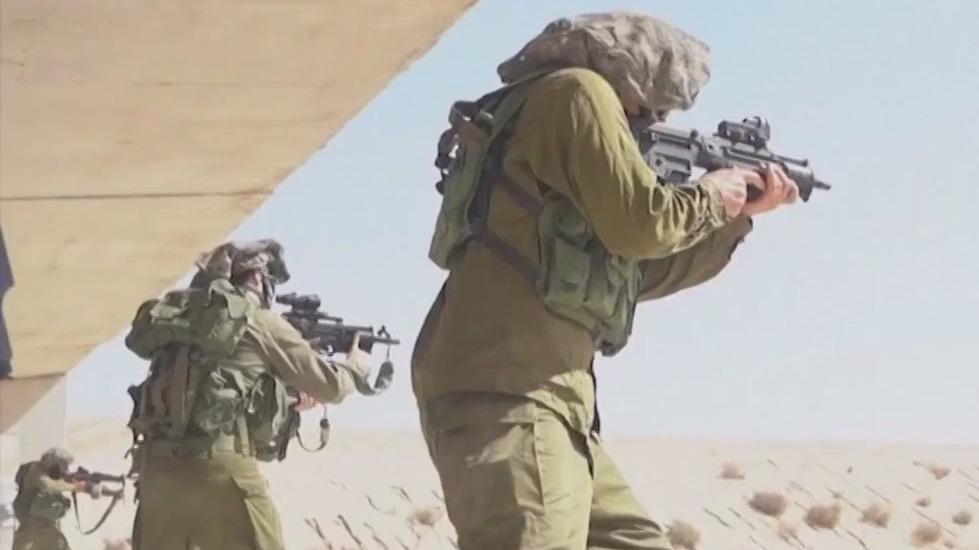 Israeli troops briefly raid northern Gaza to ‘prepare’ for expected full-scale incursion