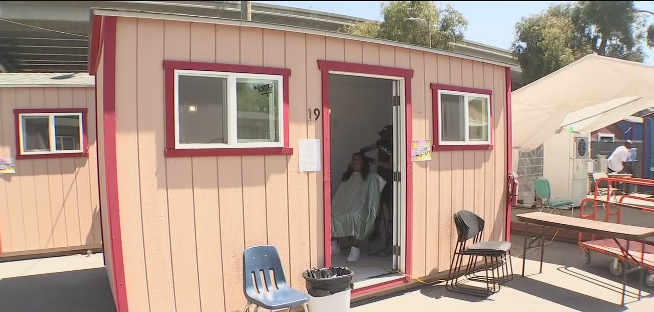 Resource fair provides social service help for Oakland tiny home residents