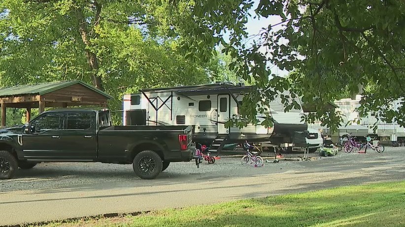 Police search for suspect who shot three men in front of children