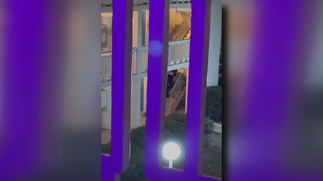 Medical examiner employee drags body down stairs