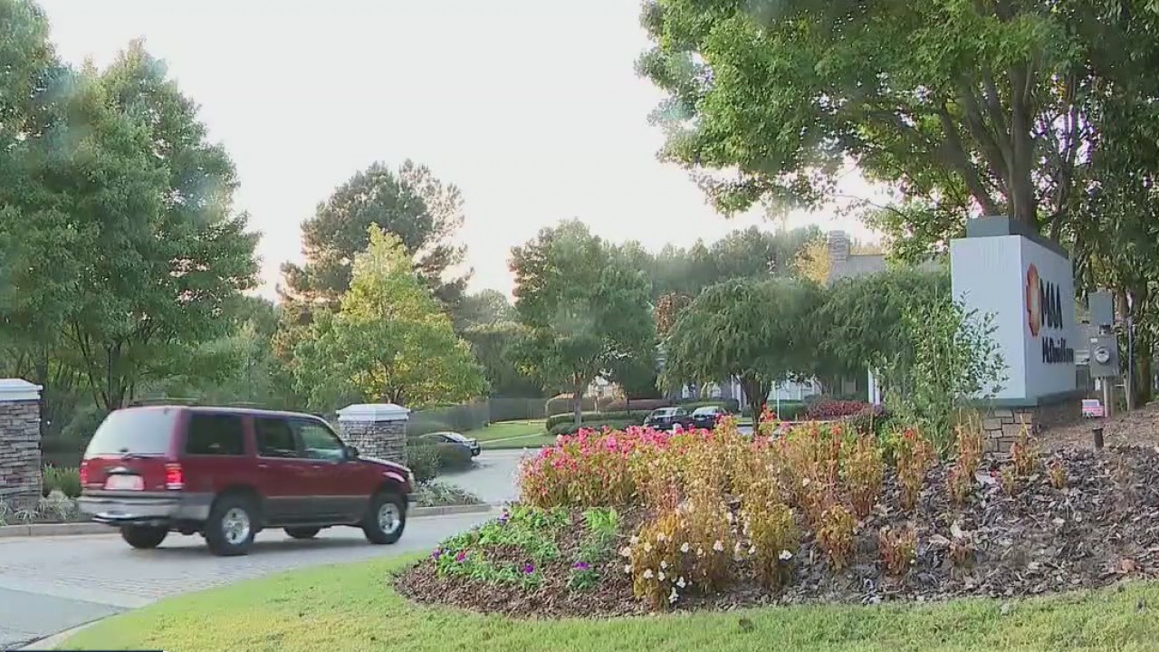 Man’s gun goes off, shoots woman in next apartment, police say