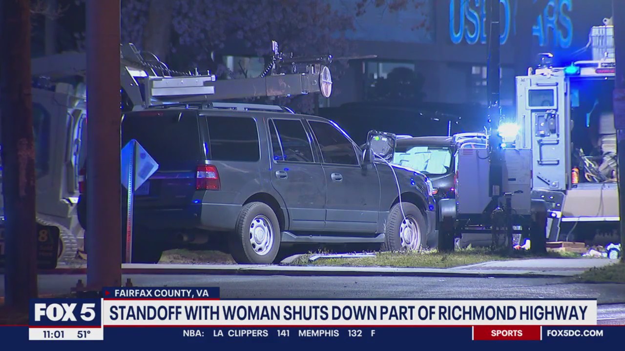 Standoff with woman continues for second night