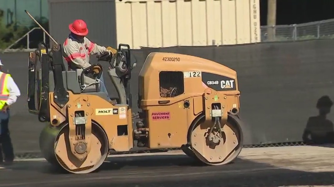 UT Arlington building parking lots with plastic roads