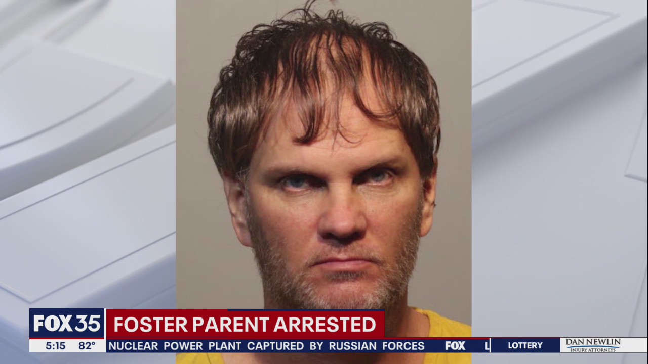 Foster parent faces voyeurism, child porn charges