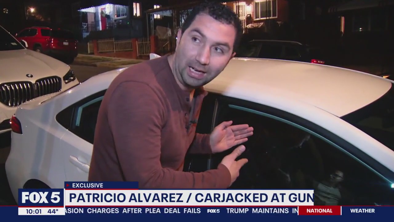 Video shows victim struggle with armed carjackers during torrential DC rainstorm