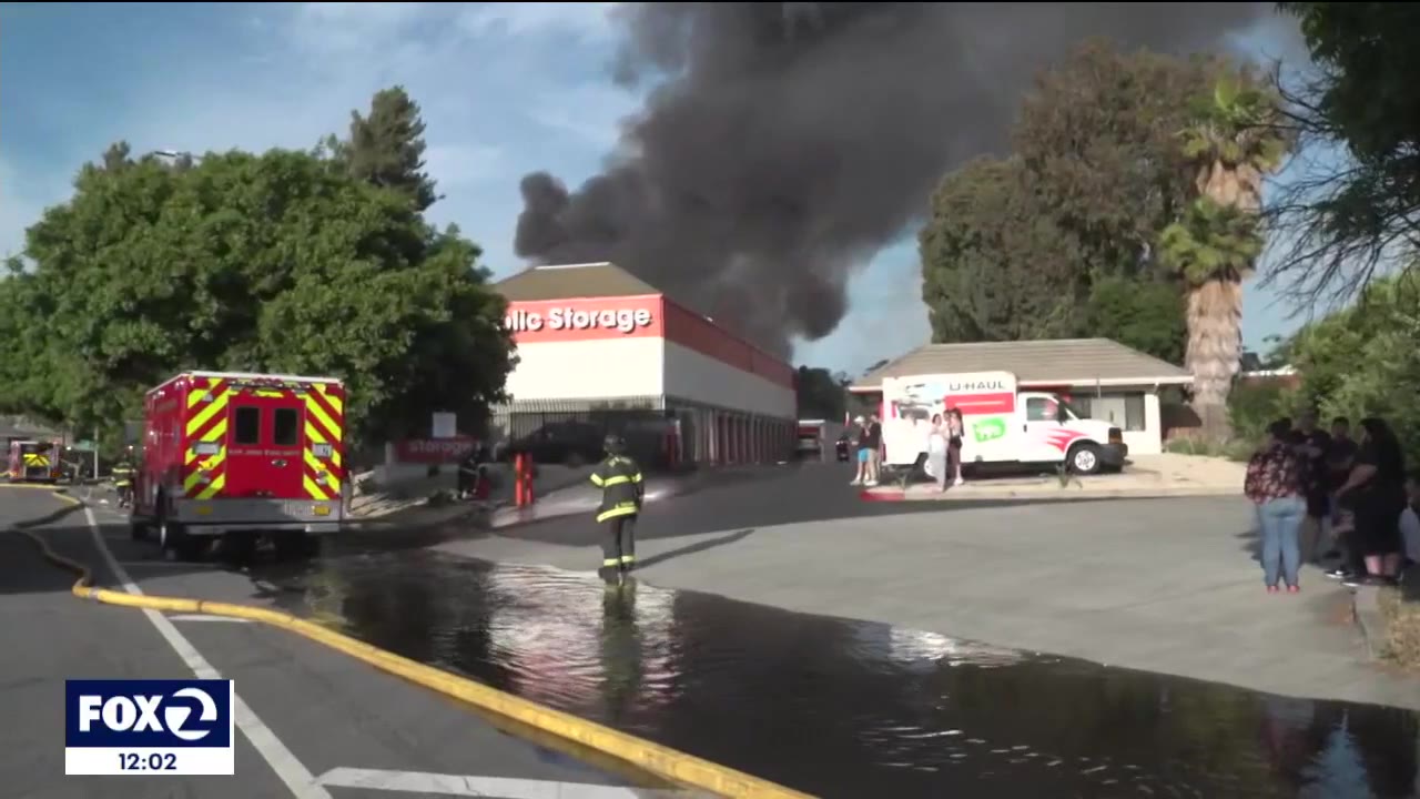 Firefighters continue to battle flames at San Jose storage facility
