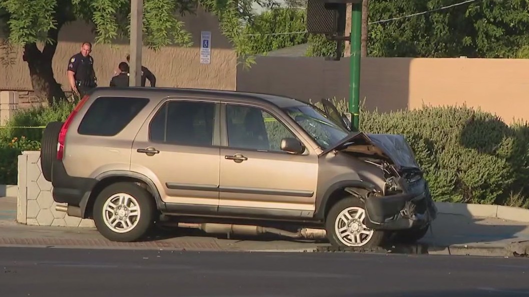 Woman hit, killed while crossing street in Phoenix