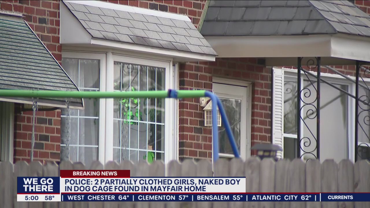 Police: 2 partially clothed girls, naked boy in dog cage found at Mayfair home