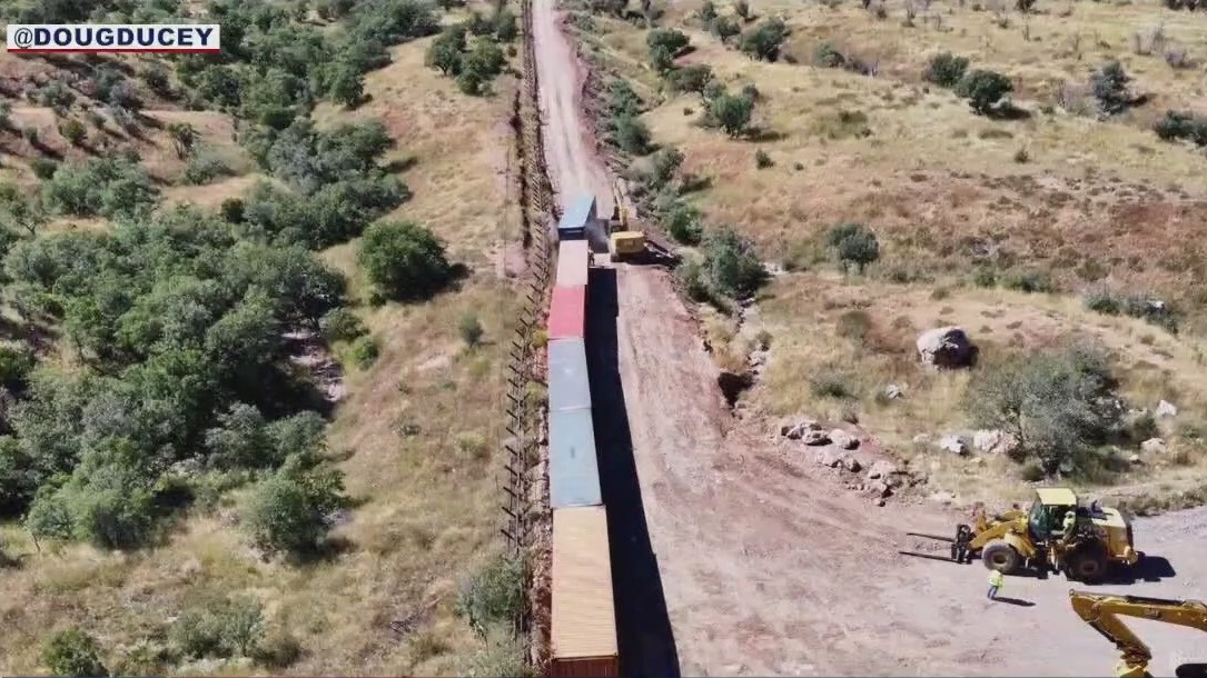 Arizona Governor Doug Ducey puts up more stacked containers along border
